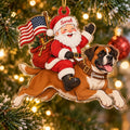 Acrylic ornament of Santa with a gift sack and an American flag, riding a leaping Boxer, names on his hat and the dog's collar
